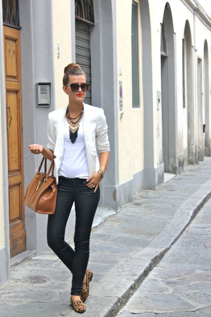 How to wear fringe. Fringe statement necklace paired with black and white and animal print