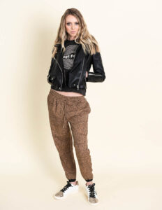 fall fashion photo shoot mixing joggers with leather moto jacket