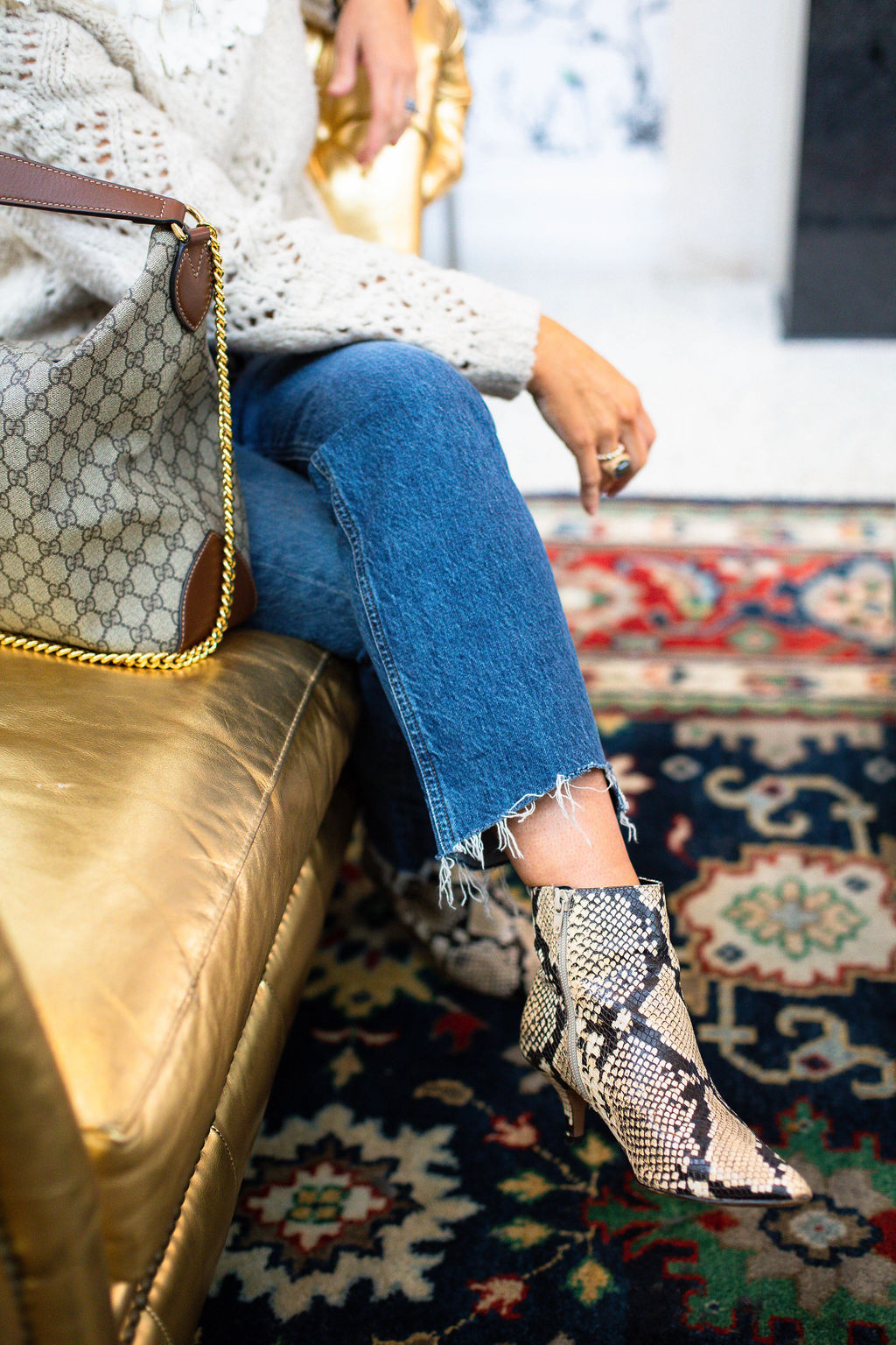 How to Wear Edgy Booties with Jeans Murfreesboro Stylist Jenny Grubb Snakeskin Booties and Raw Hem Jeans Look