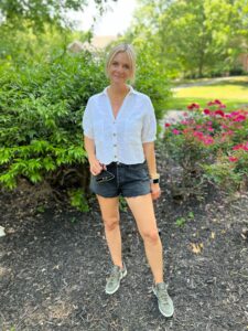 How To Wear Sneakers With Summer black cutoff shorts how to style cutoffs for summer how to wear sneakers with a button-up shirt summer style inspiration
