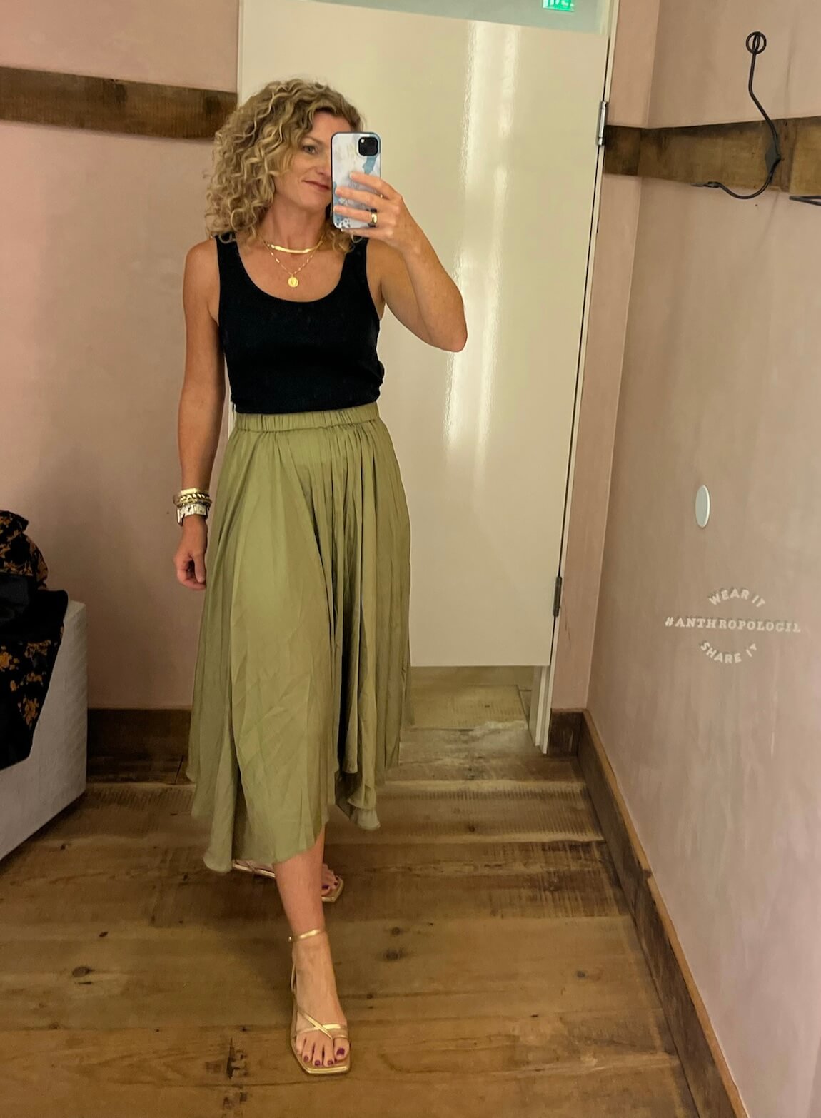 The Best Early Fall Pieces At Anthropologie asymmetrical hem skirt how to wear olive green in fall how to dress up olive green casual midi skirt dressy midi skirt