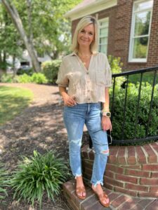 What To Wear For Sunset Safari At The Nashville Zoo cropped button-up shirt and distressed jeans