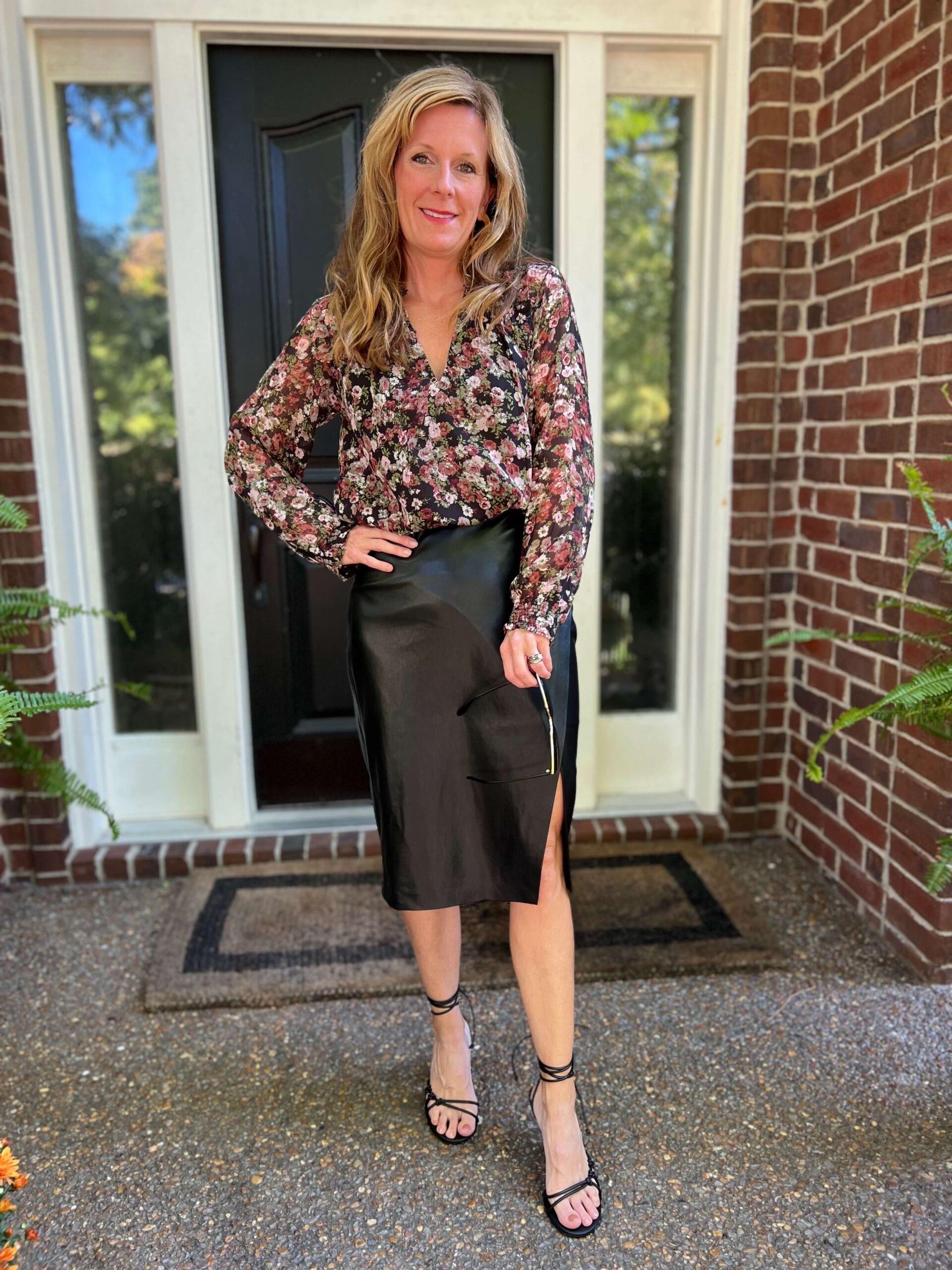 Fall Capsule Wardrobe Styled Looks - Part 2 floral blouse and midi skirt how to wear a faux leather skirt how to style faux leather date night look what to wear for a night out with the girls affordable dressy sandals affordable blouse for fall