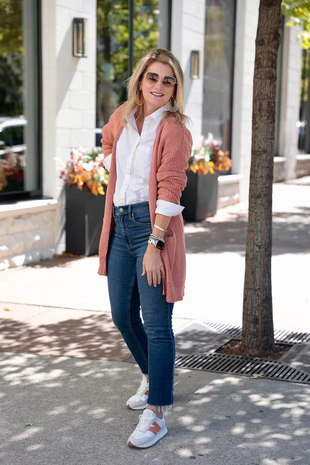 how to style a cardigan how to wear sneakers with a cardigan how to style dark wash jeans how to wear a button-up shirt with sneakers