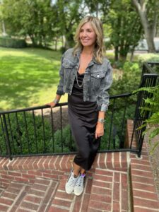 Style Inspo For Every Day Of The Week black jean jacket and slip dress and sneakers what to wear for wine night what to wear for a night out with the girls how to wear a slip dress with sneakers nashville stylists share tips on styling a slip dress how to wear a distressed black jean jacket