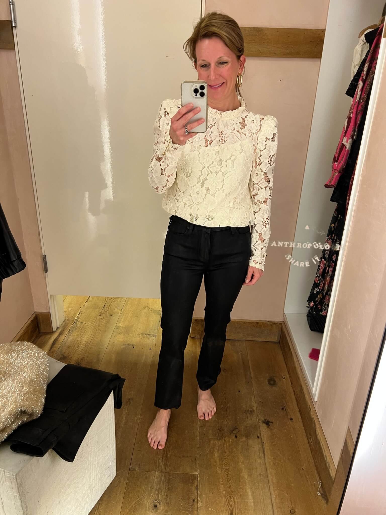long sleeve lace blouse how to wear lace for Christmas parties how to wear white and black for the Christmas season how to style coated jeans for a Christmas party
