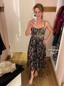 The Best Holiday Pieces At Anthropologie smocked corset dress how to wear velvet this holiday season how to wear a midi dress for holiday parties personal stylists share their favorite dresses for the holidays how to wear a corset style dress in your 40s