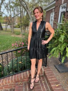 What To Wear To A Holiday Party Every Day Of The Week faux leather tiered ruffle dress how to wear faux leather this holiday season how to accessorize a black dress for the holidays how to wear a black dress for a holiday party