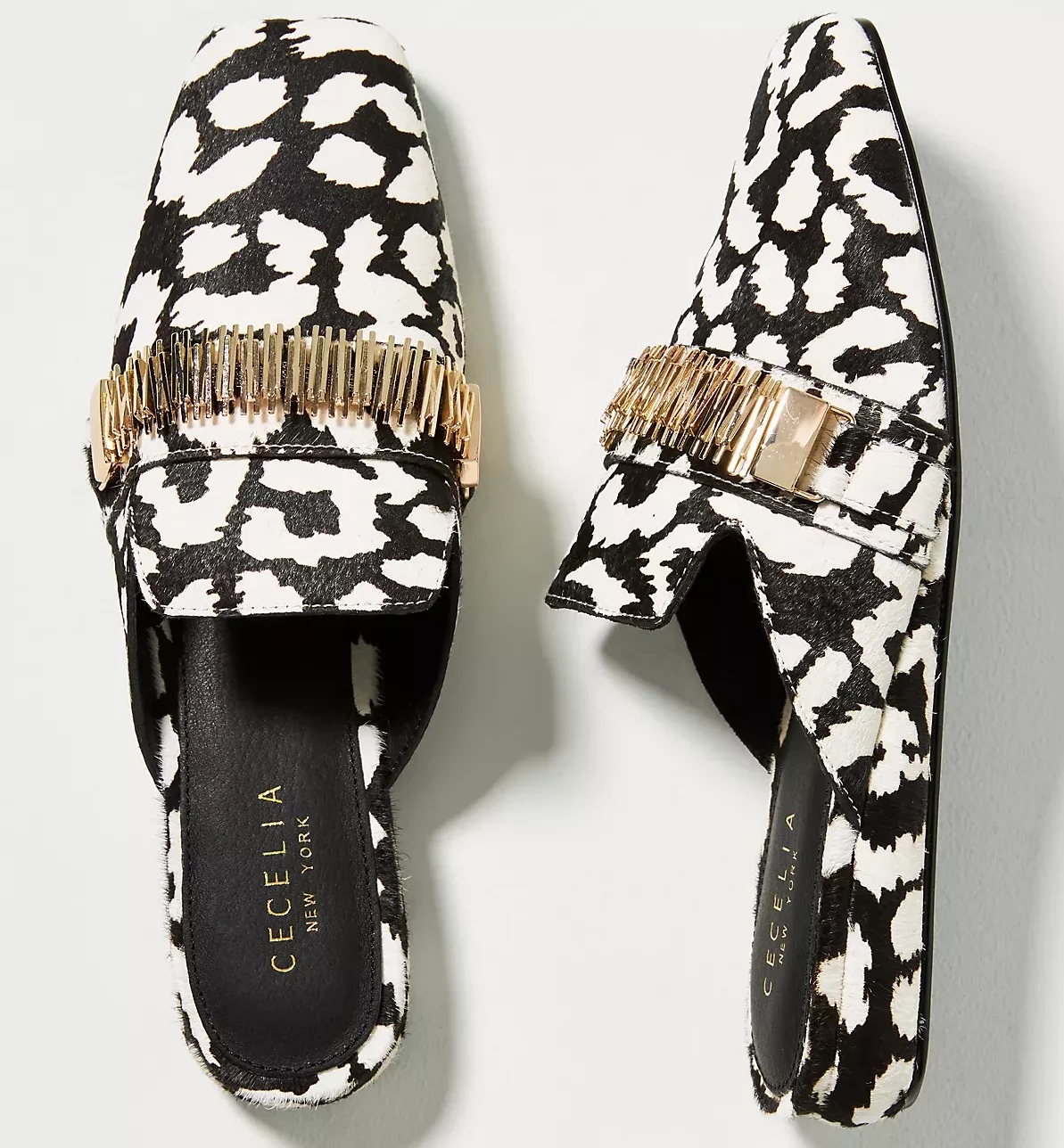 Stylist Pick Of The Week Round Up black & white statement mules how to wear black and white this winter nashville stylists share statement shoes for winter personal stylists share fun winter shoes must have winter shoes