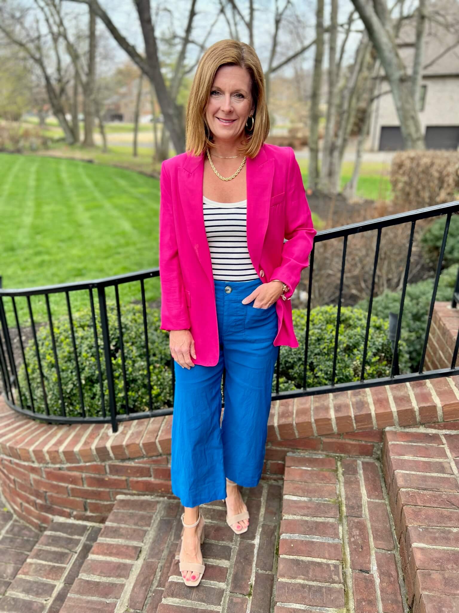 How To Create Fun Colorblocked Looks For Spring Pink Blazer & Blue Wide Leg Pants how to wear hot pink and royal blue together how to colorblock pink and blue how to wear a blazer with wide leg pants how to wear bright colors this spring personal stylists share colorblocking inspiration Nashville stylists give colorblocking tips
