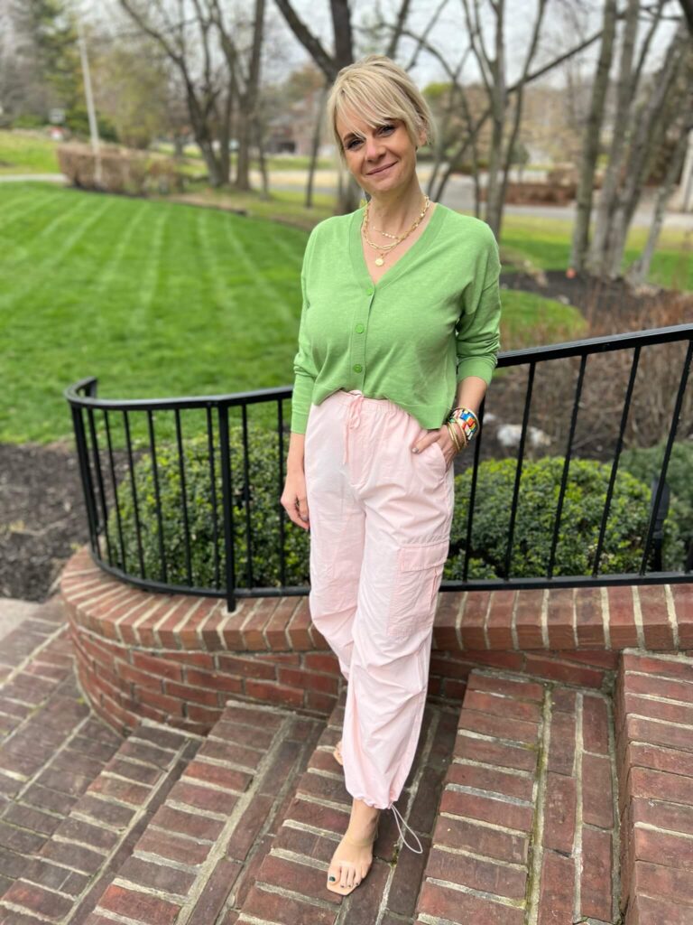 How To Create Fun Colorblocked Looks For Spring Green Cardigan & Pink Cargo Pants how to colorblock with pastel pink and light green nashville stylists share tips on wearing pink and green together how to wear pink and green personal stylists share colorblocking tips how to colorblock pink and green for spring