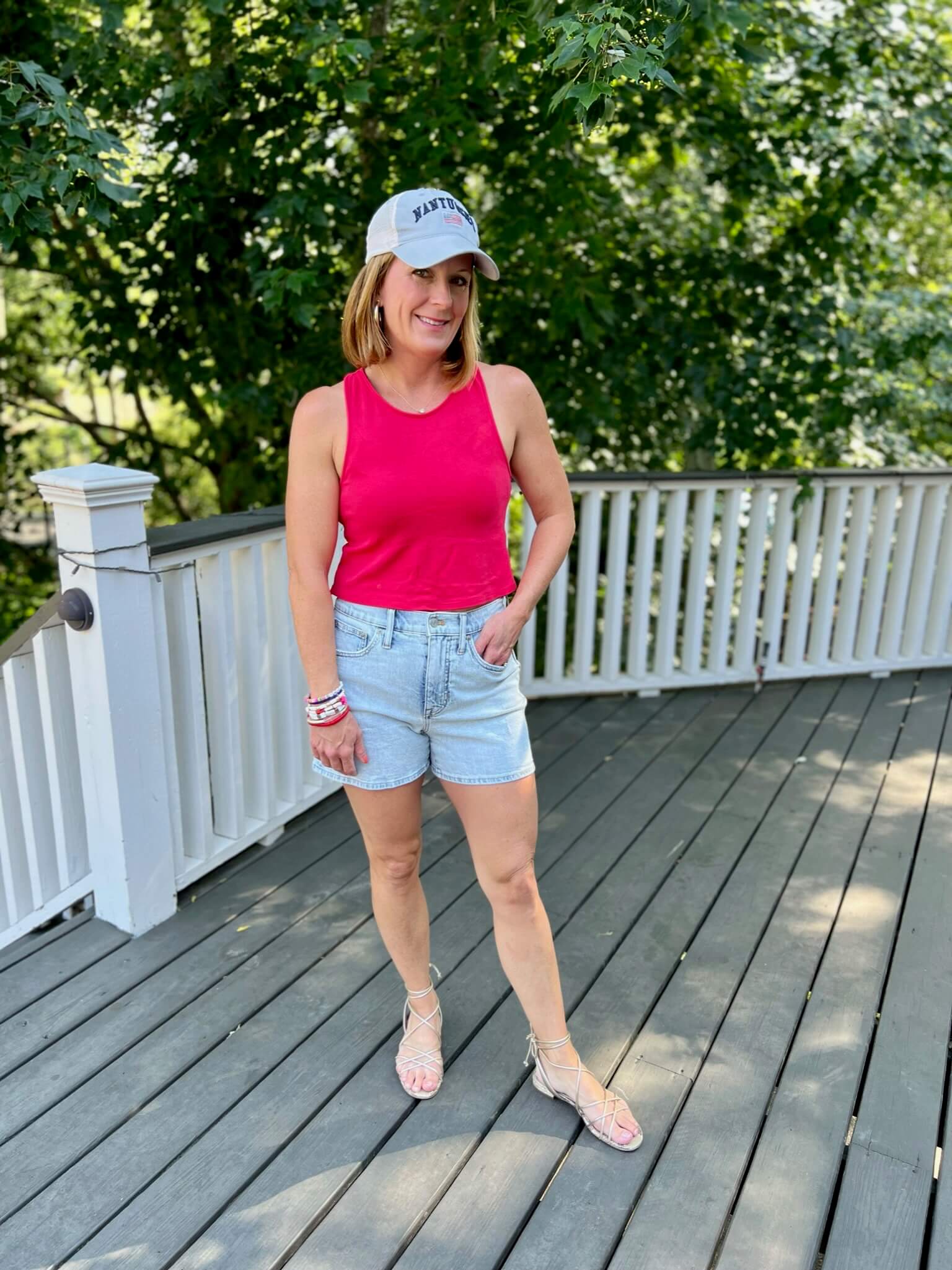 How To Look Festive For July 4th Pink Halter Top & Jean Shorts how to style a baseball hat how to wear jean shorts in your 40s how to style jean shorts in your 30 what to wear for July 4th