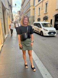 How To Pack For A European Vacation Elevated Black Short Sleeve Shirt & Olive Cargo Skirt the best belt bag for traveling must have accessories for your summer travels simple but cute summertime look