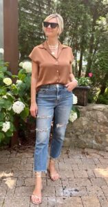 Satin Button-Up Shirt & Distressed Jeans how to create a high low look how to wear sandals with jeans how to style distressed jeans in your 40s how to wear a button-up shirt with distressed jeans personal stylists share the best gold accessories