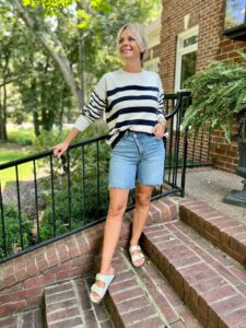 Striped Crewneck Sweater & Crossover Baggy Bermuda Jean Short how to wear Bermuda shorts how to style Bermuda shorts how to wear Birkenstocks how to wear a sweater and cutoffs how to wear a sweater and shorts