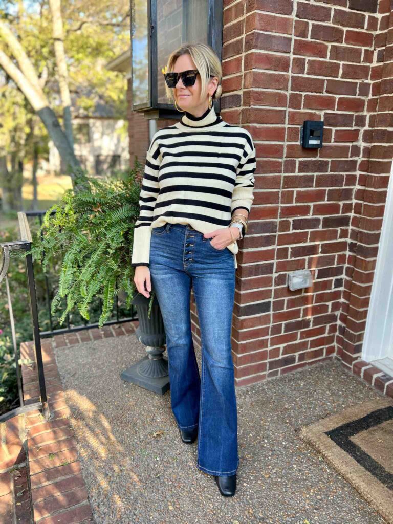 Striped Turtleneck Sweater & Flare Jeans affordable sweaters for winter sweaters under $50 how to style flare jeans how to style dark wash jeans how to wear booties with jeans elevated casual jeans look how to style a sweater and jeans affordable trendy sunglasses