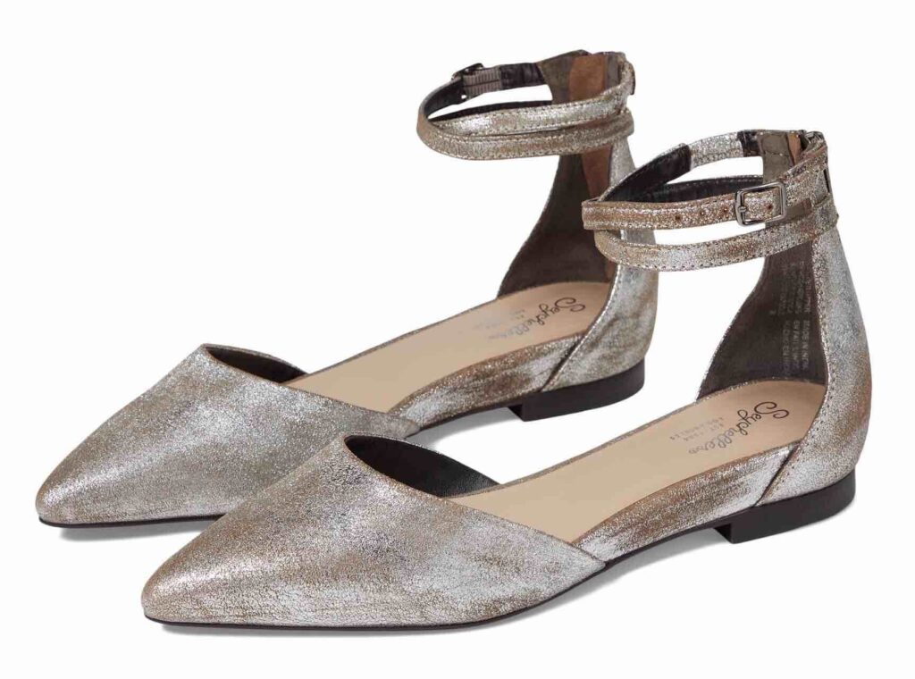 The Silver Shoe Trend Distressed Silver Ankle Strap Flat the best silver shoes for fall nashville stylists share the best silver shoes personal stylists share their favorite silver shoes how to shop the silver shoe trend must have shoes for fall versatile shoes for fall must have metallic shoes for fall how to buy metallic shoes