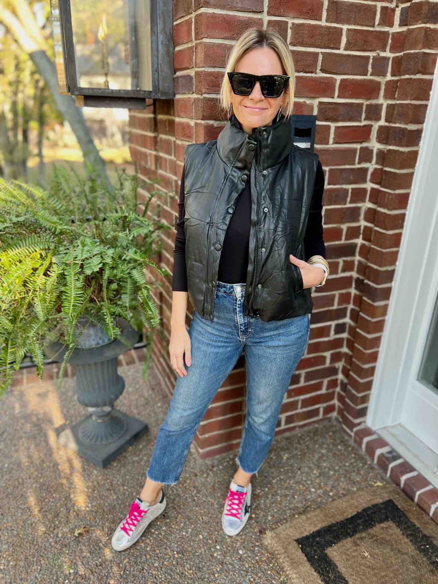 10 Ways To Wear A Bodysuit This Fall personal stylists share styled looks with bodysuits nashville stylists share style inspo for bodysuits Faux Leather Vest & Bodysuit & Jeans how to layer a bodysuit under a vest how to wear a bodysuit with jeans