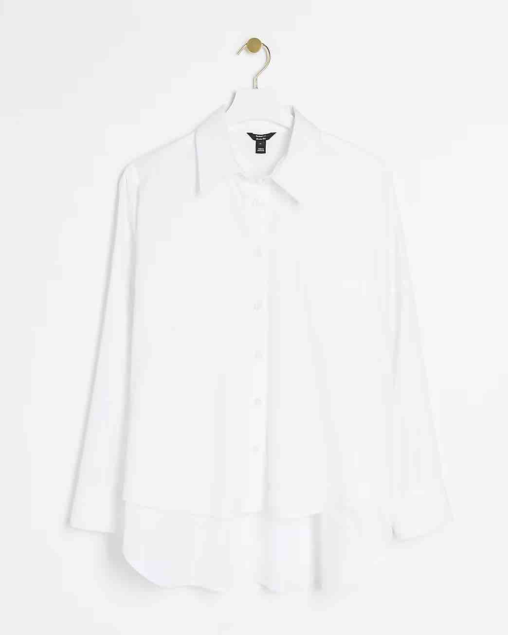 Five Things We Are Loving At River Island Poplin Longline Button-Up Shirt staple winter wardrobe pieces affordable must have pieces for winter what to buy for your winter closet affordable button-up shirt for work affordable top for work affordable blouse for the office