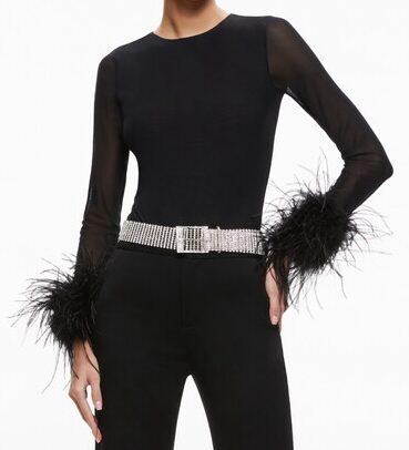 Feather Cuff Sleeve Top Christmas party style inspiration holiday party style inspiration personal stylists share holiday party style inspo new years eve style inspo how to wear feathers for a Christmas party 