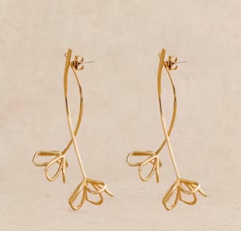 Five Things We Are Loving At Sezane gold flower drop earrings personal stylists share must have pieces for spring nashville personal shoppers share five favorites for summer what to buy this spring and summer spring staples summer staples must have earrings for spring and summer versatile earrings for spring and summer
