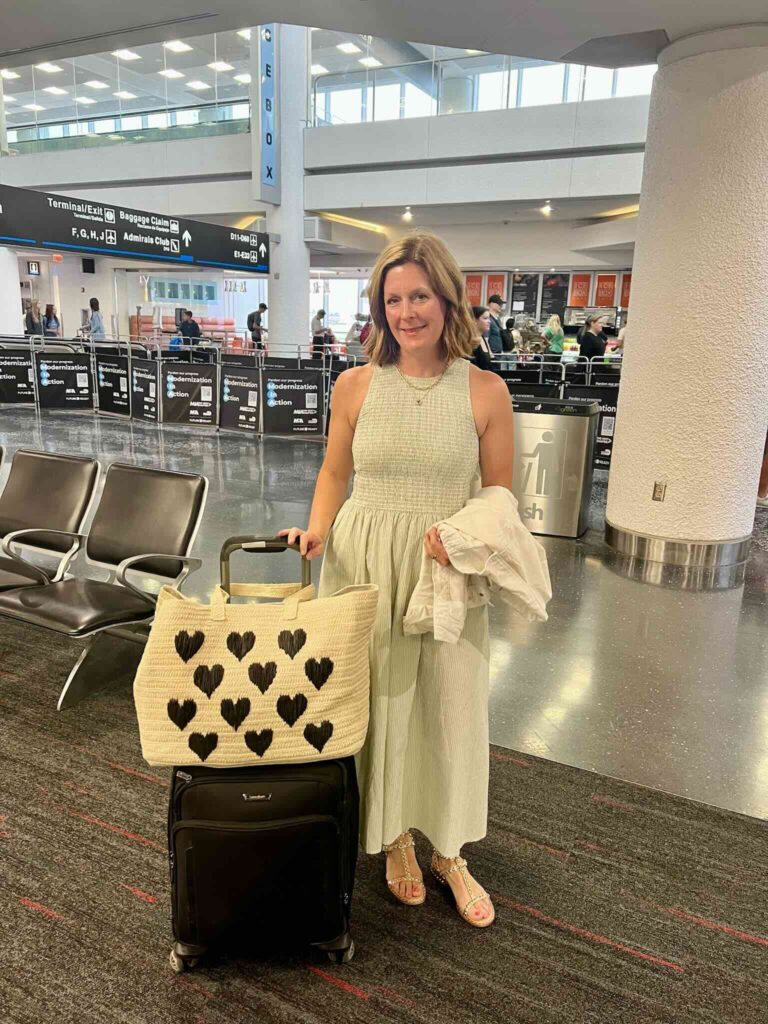 Smocked Bodice Midi Dress what to wear for a long travel day how to wear a dress for travel what to wear on the airplane this summer how to travel in style how to loom stylish while flying airport style travel style