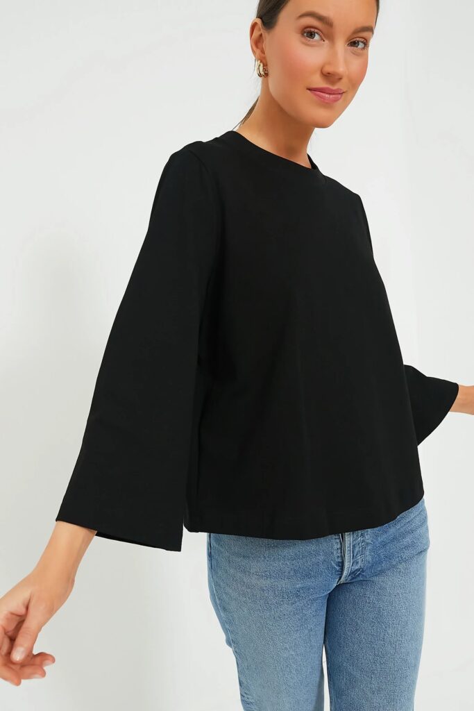 Things To Avoid This Holiday Season Flared Sleeve Tee modern bell sleeve top how to buy a bell sleeve top holiday wardrobe staples what to wear for new years eve closet staples what to wear for NYE